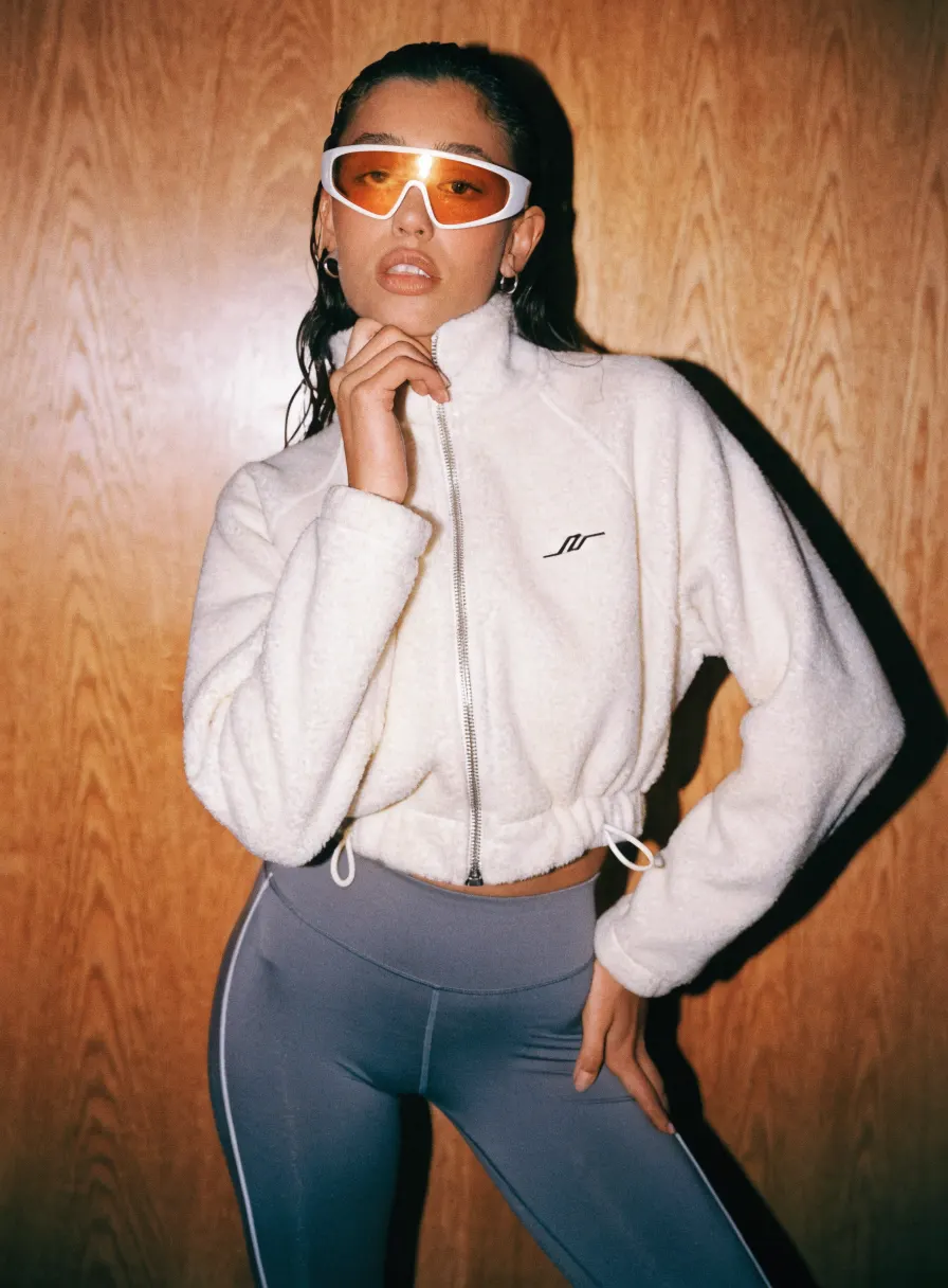 Sportswear campaign shot with direct flash, AI product photography by ENLY